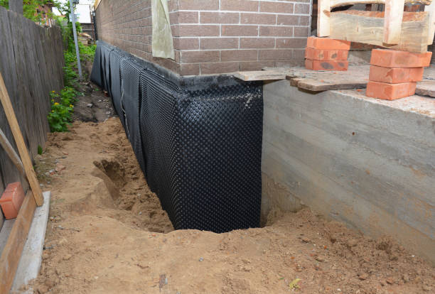 Happy homeowners after waterproofing job in Worcester
